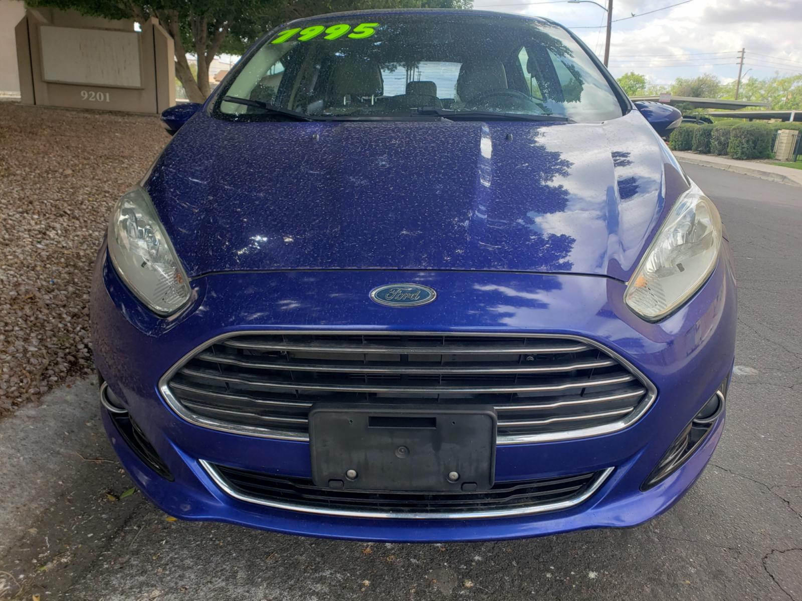 2014 /Tan and black Ford Fiesta Titanium (3FADP4FJ5EM) with an 1.6l i4 engine, 6-Speed Automatic transmission, located at 323 E Dunlap Ave., Phoenix, AZ, 85020, (602) 331-9000, 33.567677, -112.069000 - 2014 Ford Fiesta Titanium,.......A Must See!!... No accidents, Only 95K MILES.... Ice cold AC. The car is gorgeous inside and out. Power windows, Power door locks, Touch screen Stereo/ CD Player, Phone sync, Bluetooth, Satellite compatible, Backup camera, Beautiful tan and black interior with tan le - Photo #1
